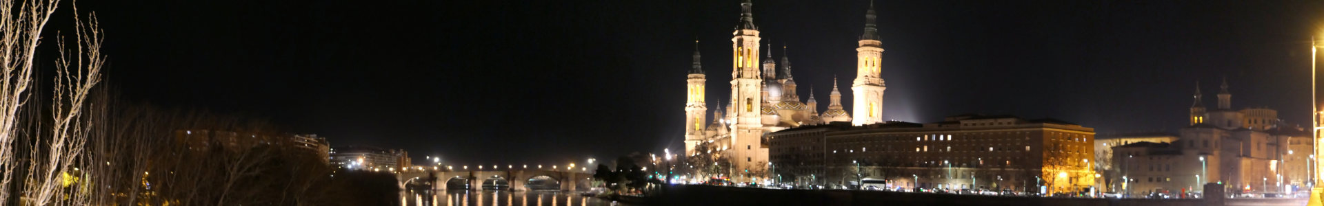 Vue sur l'Èbre et les monuments de Saragosse la nuit | Cliquer pour agrandir Photo qui montre une Vue sur l'Èbre et les monuments de Saragosse la nuit, Aragon, Espagne | Cliquer pour agrandir