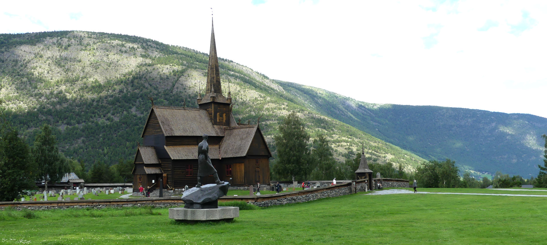 Stave church with its Lutheran cemetery. | click to enlarge Photo of Stave church with its Lutheran cemetery. | click to enlarge